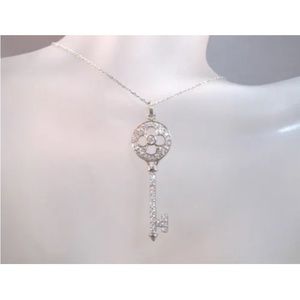 Sterling silver with rhodium cz key pendant necklace